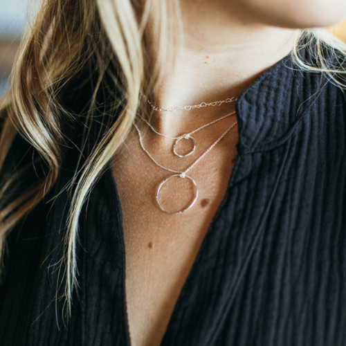 5 Gifts Under $50: Veronica & Harold Claire Hammered Hoop Necklace on model
